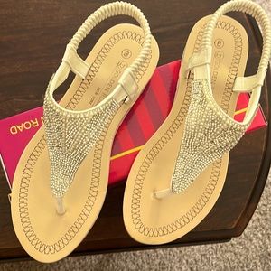 Golden Road Size 8 white sandals.